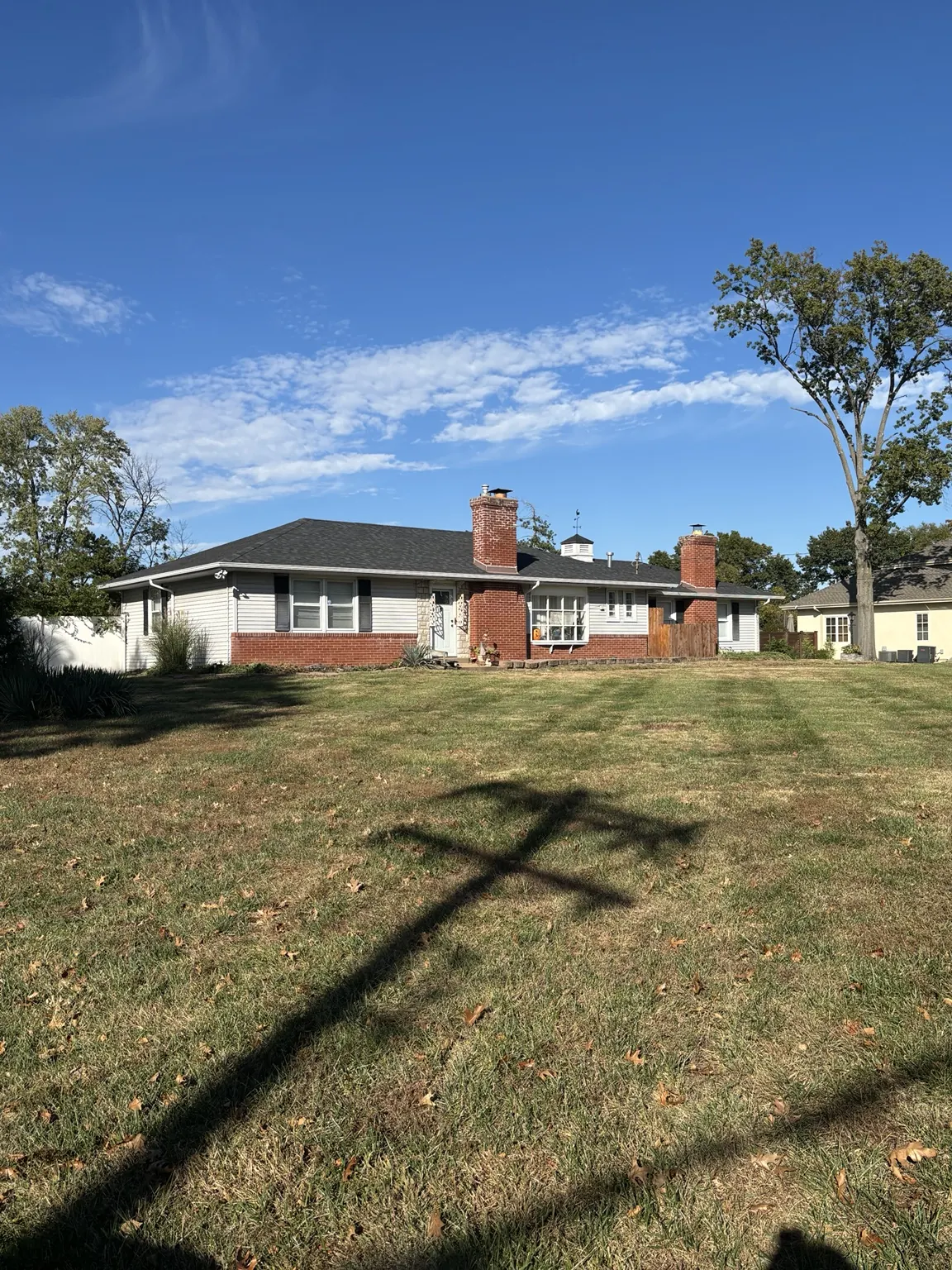 Completed gutters and downspouts, front elevation