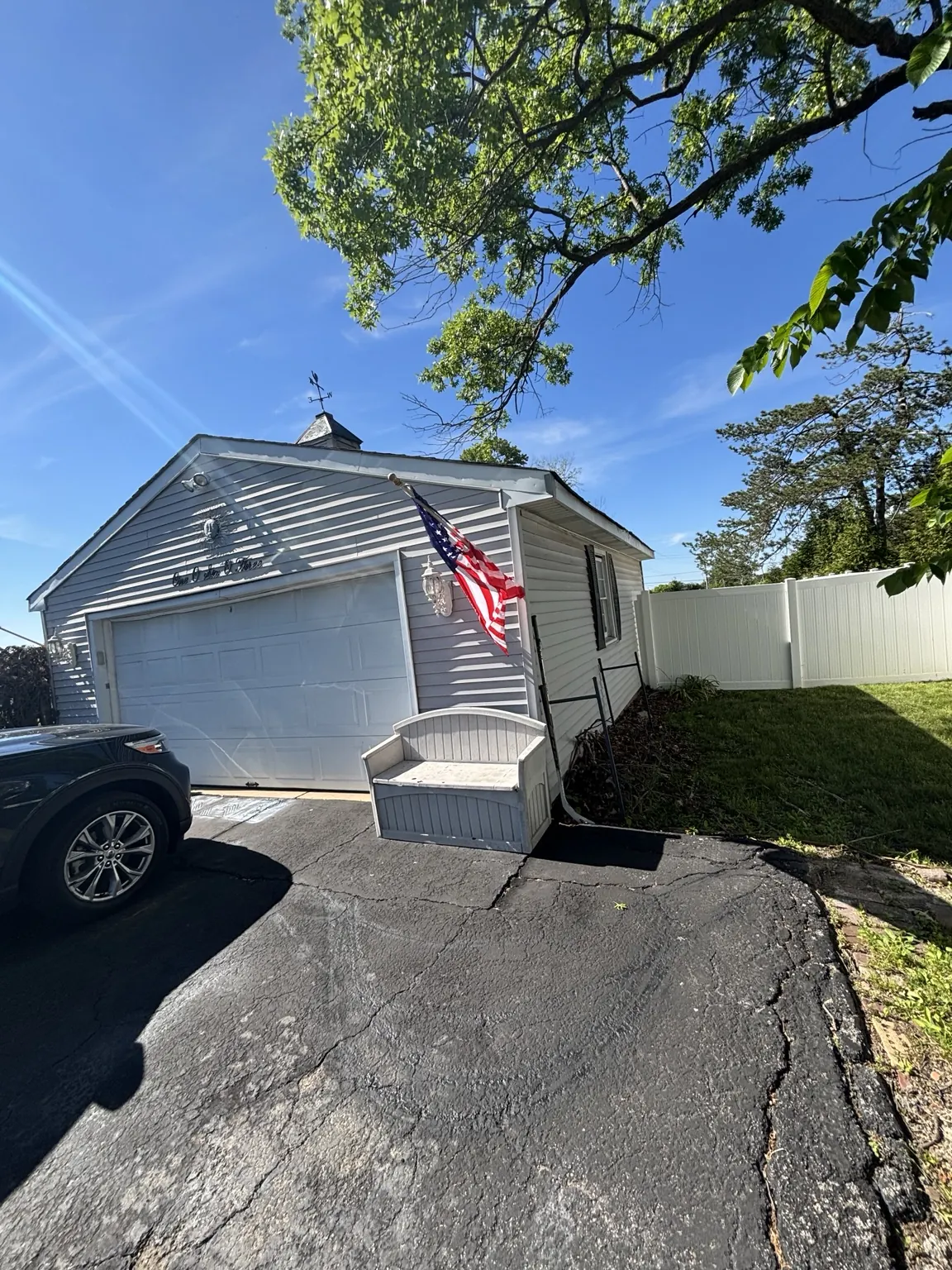 Driveway-side roofline before replacement