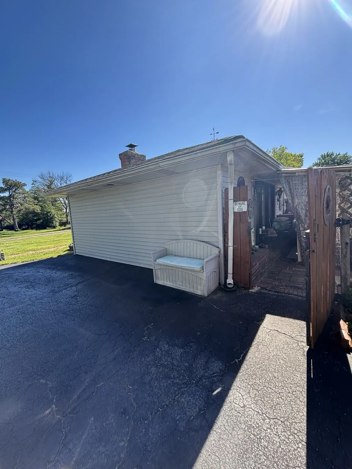 Garage-side exterior before replacement