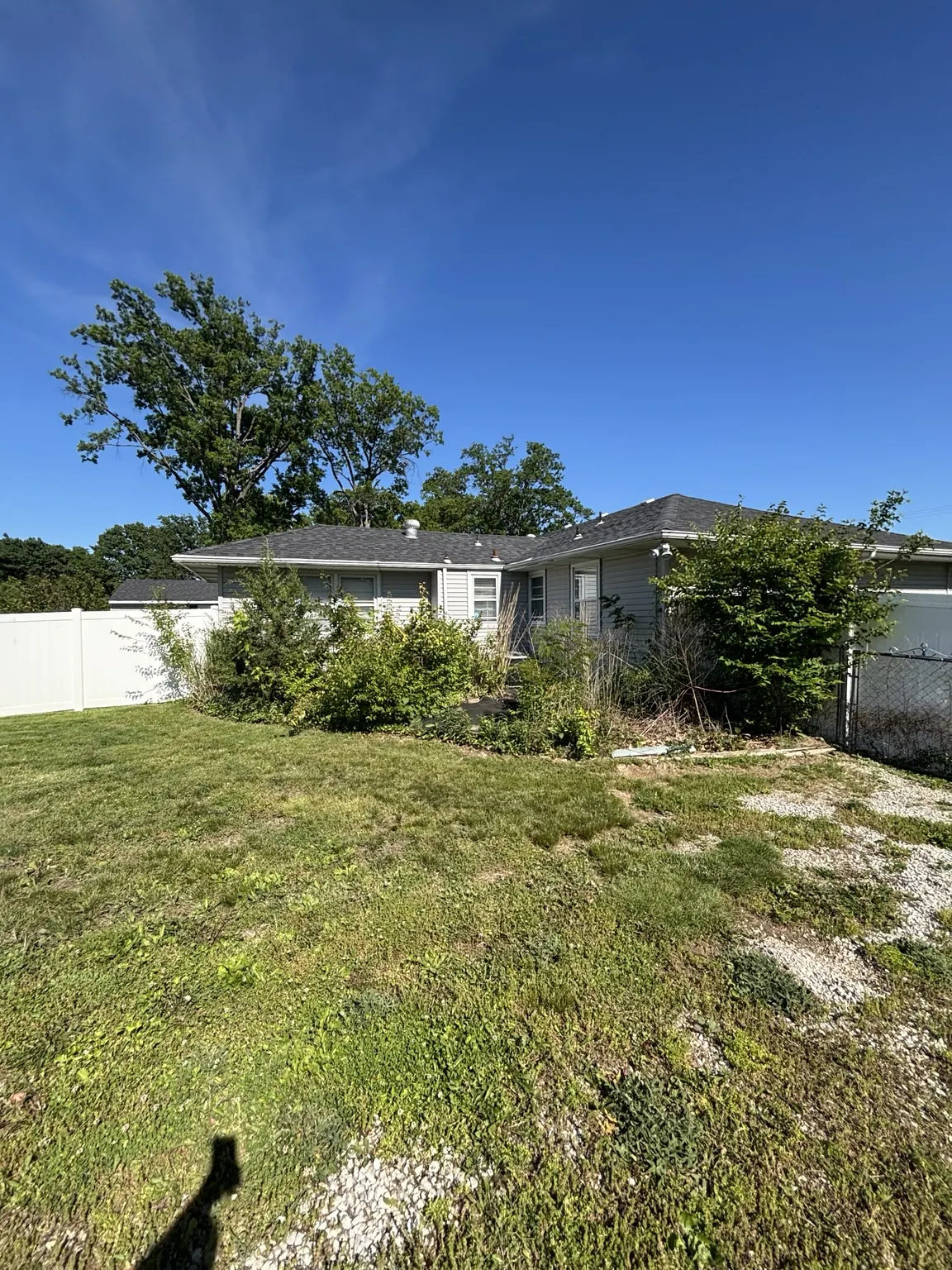Wide view of the home before replacement