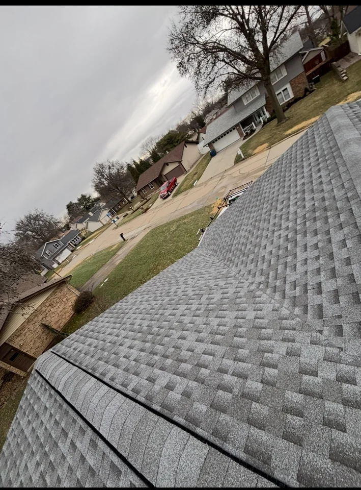 Residential shingle roof from upper roofline